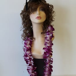 Mannequin bust wearing a graduation cap and purple orchid lei