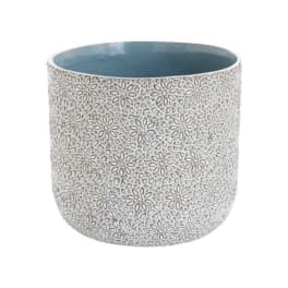Patterned ceramic planter with a blue interior
