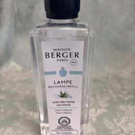 Clear bottle of Maison Berger Lampe refill with black cap