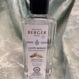 Clear bottle of Maison Berger Pure White Tea refill with a black cap