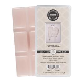 Pink scented wax bar in plastic packaging with a label