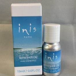 A small bottle and box of Inis home refresher oil