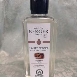 Clear bottle of Maison Berger lamp refill with a black cap