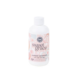 Bottle of Sweet Grace laundry detergent with a pastel patterned label