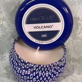 Blue Capri Blue Volcano candle in a patterned tin container