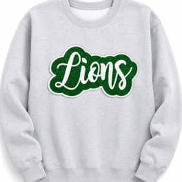 Gray sweatshirt with a green "Lions" patch on the chest