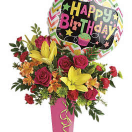 Birthday bouquet with roses, lilies, and a "Happy Birthday" balloon