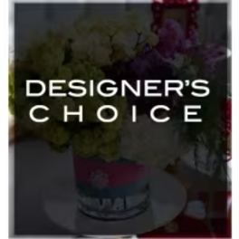 Designer’s Choice floral arrangement in a container