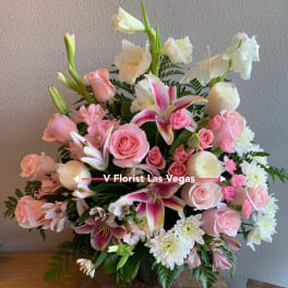 Pink and white mixed bouquet with roses, lilies, and daisies