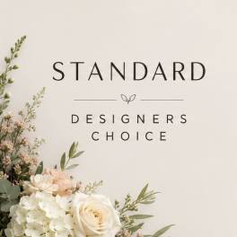 Cream and blush floral arrangement with roses and hydrangeas beside text reading Standard Designers Choice