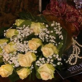 Bouquet of pale yellow roses with white baby's breath