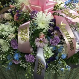 Spring colors casket spray