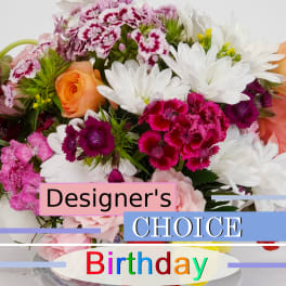 Mixed bouquet of roses, daisies, and carnations in pink, white, and orange