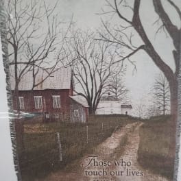 Memorial blanket with a farmhouse scene and remembrance text