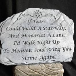 Memorial stone with an engraved sympathy poem