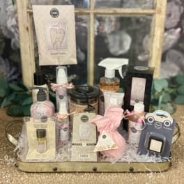 Gift basket of bath and body products with pink packaging