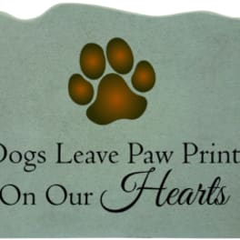 Paw print memorial plaque with the words Dogs Leave Paw Prints On Our Hearts