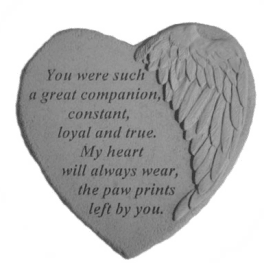 Heart-shaped memorial stone with engraved text and angel wing