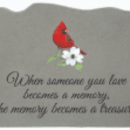 Gray memorial plaque with a red cardinal and white flower graphic