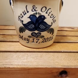 Ceramic planter with blue bird design and the names Paul & Olivia