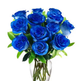 Bouquet of blue roses in a clear glass vase