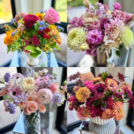 Four colorful mixed flower arrangements in vases and containers