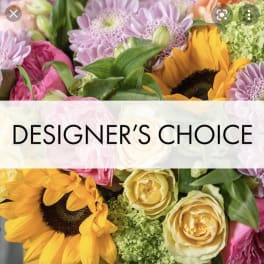 Mixed bouquet with sunflowers, roses, and pink daisies
