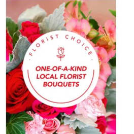 Mixed bouquet of red and pink roses with pale pink blooms