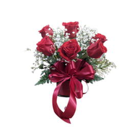 Bouquet of red roses with white baby's breath and a red ribbon