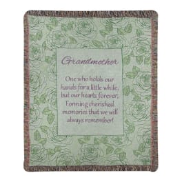 Floral-patterned blanket with the word Grandmother and a memorial quote