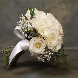 White rose bouquet with baby's breath and a white ribbon