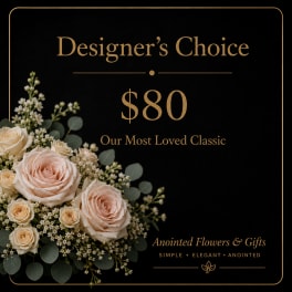 Designer’s Choice floral arrangement with blush roses and white filler flowers