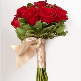 Red rose bouquet with a satin ribbon wrap