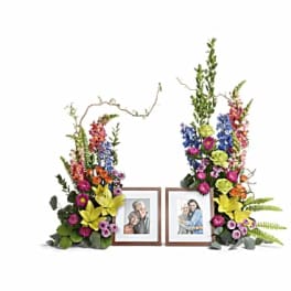 Two floral photo frames with colorful flowers and greenery