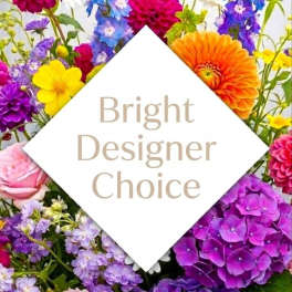 Bright mixed bouquet with dahlias, hydrangeas, roses, and blue delphinium
