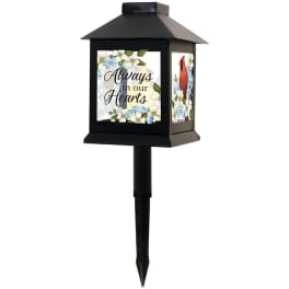 Black memorial lantern stake with floral panels and "Always in our Hearts" text