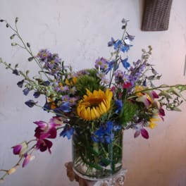 Colorful mixed bouquet in a clear glass vase
