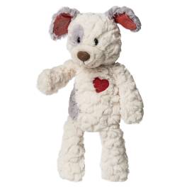 Plush white dog with red heart on its chest