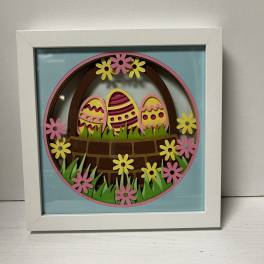 Framed Easter egg paper art with flowers and grass