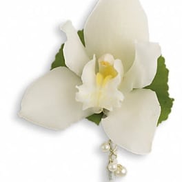 White orchid corsage with pearl accents