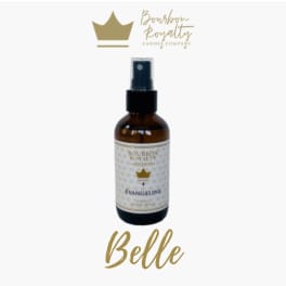 Amber spray bottle labeled Bourbon Royalty Belle candle company