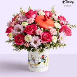 Pink rose bouquet in a Disney character vase with a red lid