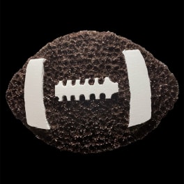 Football-shaped floral foam base with white foam accents