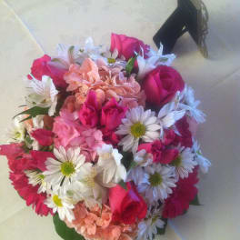 Pink and white mixed bouquet with roses, daisies, and lilies