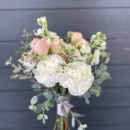 Bouquet of white and blush flowers with eucalyptus