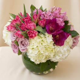 Pink and white mixed bouquet in a glass vase