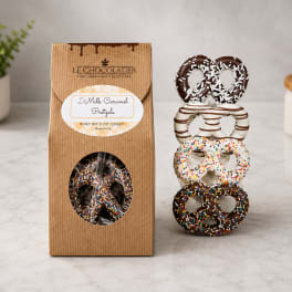 Box of chocolate-covered pretzels with assorted toppings