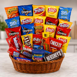 Basket filled with assorted snack bags and candy bars