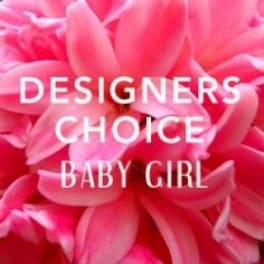 Pink flower petals with the words "Designer’s Choice Baby Girl"