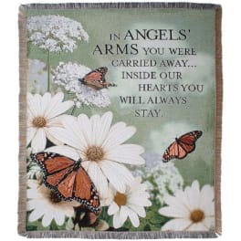 Memorial blanket with white daisies, butterflies, and a sympathy message